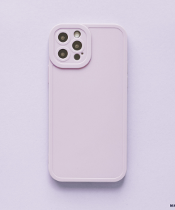 A lilac NAKD phone case from Coconut Lane's spring collection is showcased from the back against a matching background. The case features full camera protection for a quad camera setup located at the top left corner. Its sleek and minimalistic design makes it one of this season's pastel favorites.