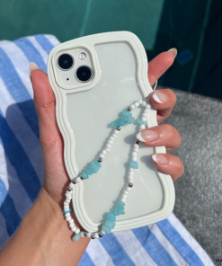 Clear Phone Case with Cream Curvy Edges.