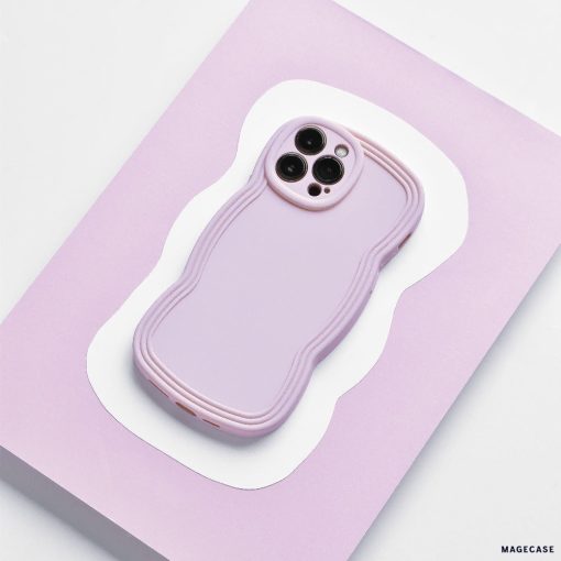 A NAKD Curvy smartphone with a Coconut Lane NAKD Curvy Phone Case - Blueberry, featuring a wavy, textured design, is placed on a light purple and white background. The lightweight case covers the phone completely, with cutouts for the camera and other necessary ports.