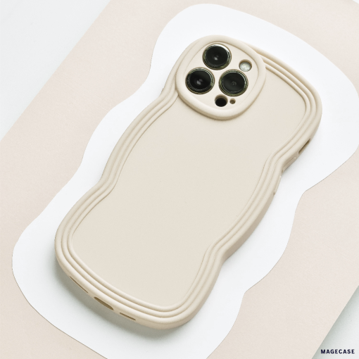 Flatlay style image of cream phone case with wavy edges.