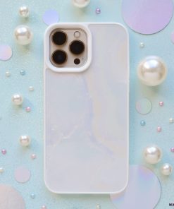 A white iPhone15 with a Coconut Lane Mother of Pearl Phone Case is placed on a pastel background adorned with scattered faux pearls and iridescent circular discs. The phone, showcasing its three camera lenses and sleek design, exhibits an elegant pearlescent effect.